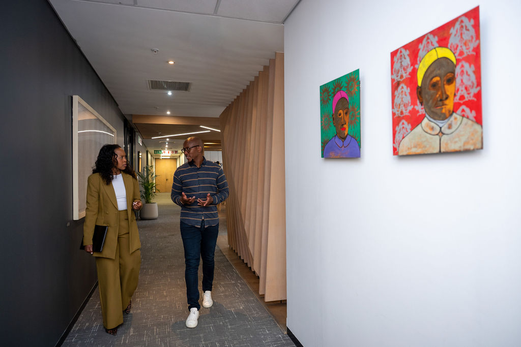 Members walking the corridor at 96 Rivonia